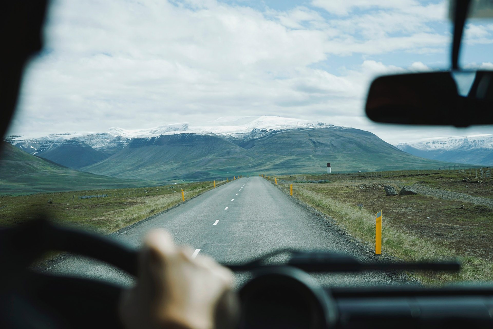 driving-towards-mountains-open-road